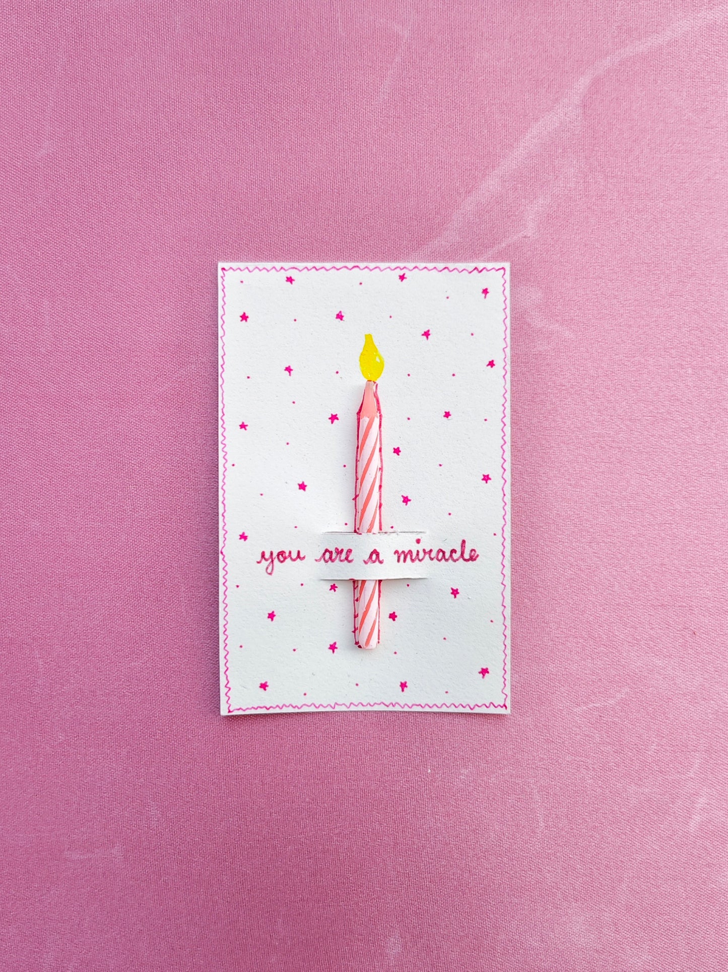 Pink color card with calming cute candle for gifting needs